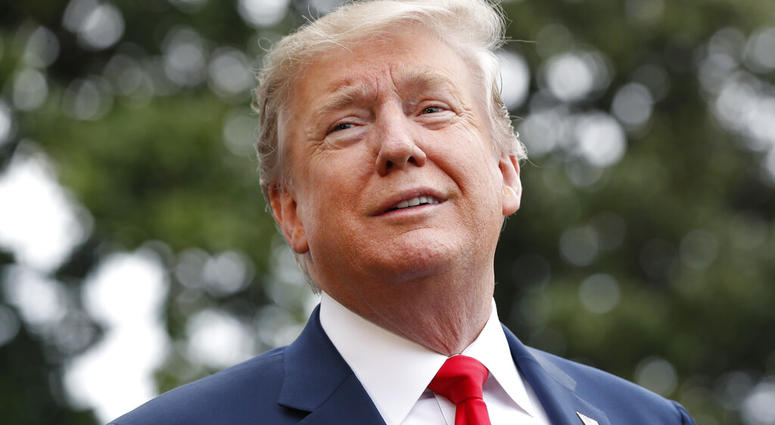President Donald Trump speaks to the media as he departs the White House, Friday April 26, 2019, as he leaves Washington headed to Indianapolis where he is expected to speak at the annual meeting of the NRA. (AP Photo/Jacquelyn Martin)