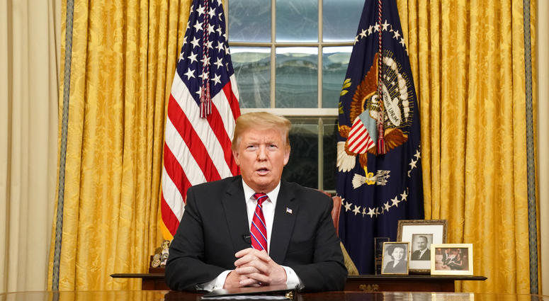 President Donald Trump speaks from the Oval Office of the White House as he gives a prime-time address about border security Tuesday, Jan. 8, 2018, in Washington. (Carlos Barria/Pool Photo via AP)