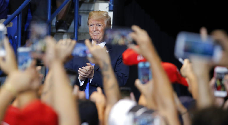 President Donald Trump arrives at a rally, Thursday, Aug. 2, 2018, at Mohegan Sun Arena at Casey Plaza in Wilkes Barre, Pa. (AP Photo/Carolyn Kaster)