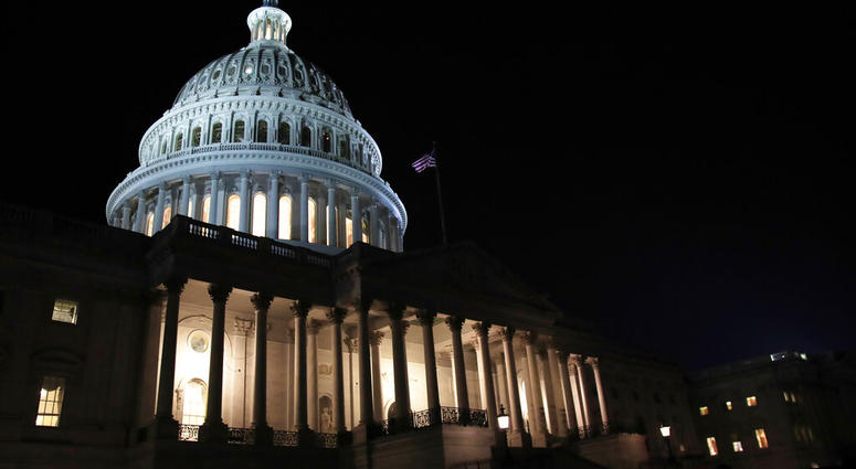 FILE- In this Feb. 5, 2019, file photo lights illuminate the U.S. Capitol dome in Washington. On Thursday, Feb. 14, the Labor Department reports on the number of people who applied for unemployment benefits last week. (AP Photo/Manuel Balce Ceneta, File)