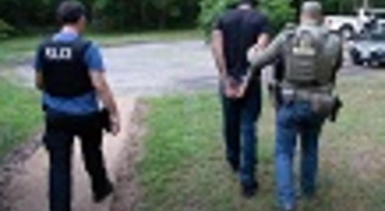 An arrest is made during Operation Washout, an operation involving local, state, and federal law enforcement. (Shane T. McCoy / US Marshals)