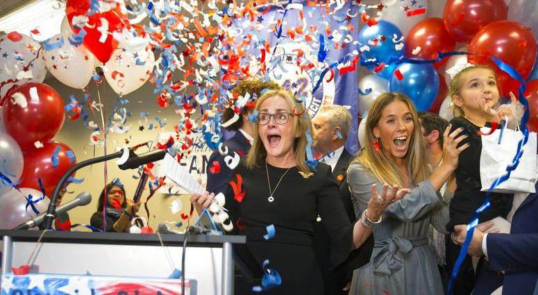 Democrat Madeleine Dean celebrates after winning Pennsylvania's 4th Congressional District race, in Fort Washington, Pa., Tuesday, Nov. 6, 2018. (Charles Fox/The Philadelphia Inquirer via AP)