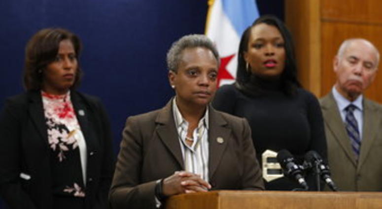 Mayor Lori Lightfoot speaks during a news conference at Chicago City Hall. Lightfoot said classes would be canceled Thursday after determining that she can't accept the Chicago Teachers Union's demands. (Jose M. Osorio/Chicago Tribune via AP)