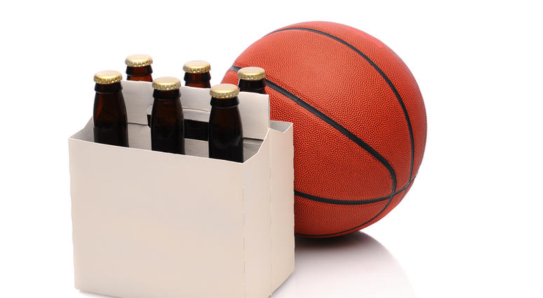Six pack of beer bottles with a basketball. Steven Cukrov | Dreamstime.com Six pack of beer bottles with a basketball. Steven Cukrov | Dreamstime.com
