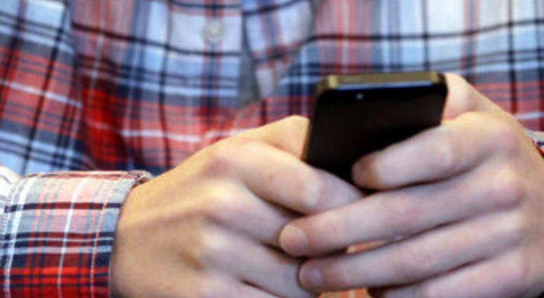 A mysterious wave of texts swept America’s phones overnight Wednesday, Nov. 6, 2019, delivering unintelligible messages that left many people mildly confused when they woke up on Thursday. (AP Photo/Nam Y. Huh, File)
