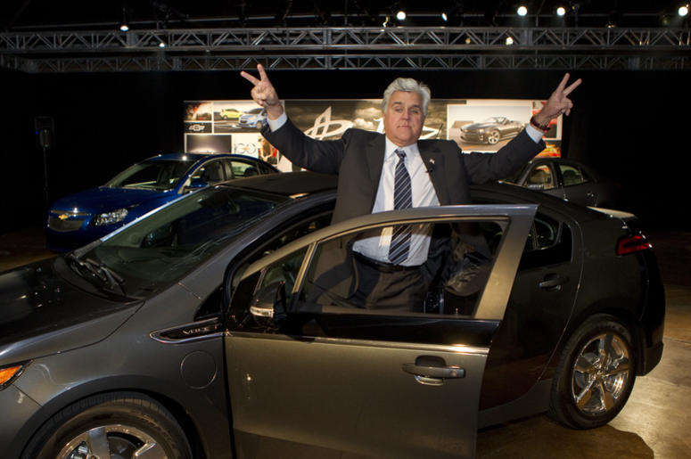 jay leno standing by car