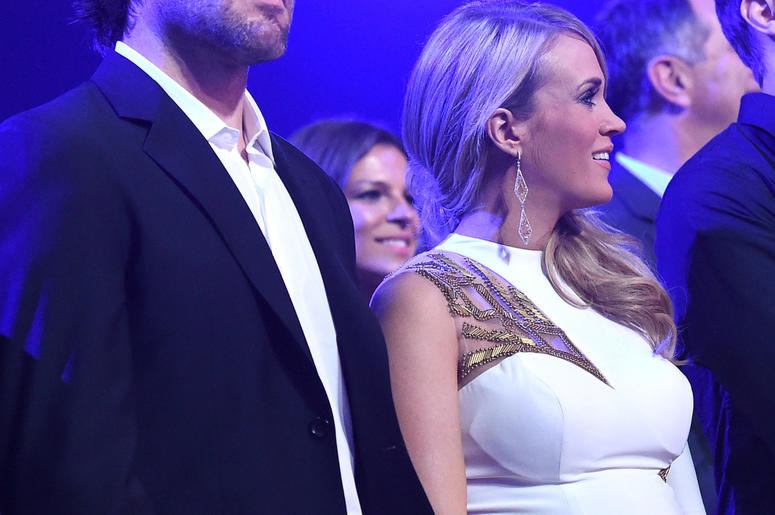 Pregnant Carrie Underwood and husband Mike Fisher at 2014 American Country Countdown Awards in Nashville Pregnant Carrie Underwood and husband Mike Fisher at 2014 American Country Countdown Awards in Nashville