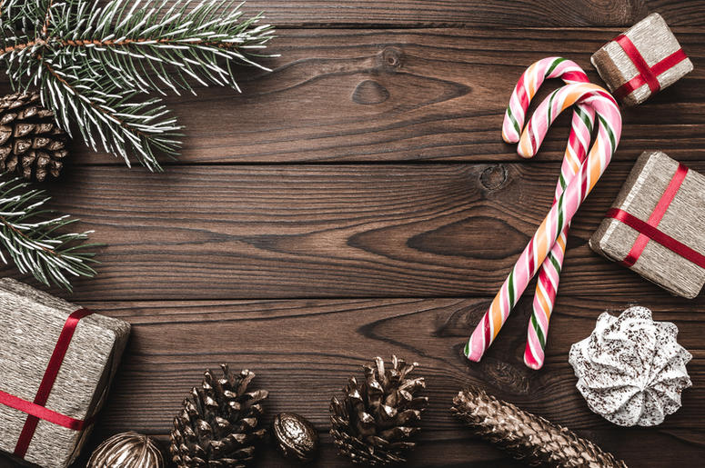Fir tree, decorative cone, sweets, and gifts for holidays. Fir tree, decorative cone, sweets, and gifts for holidays.