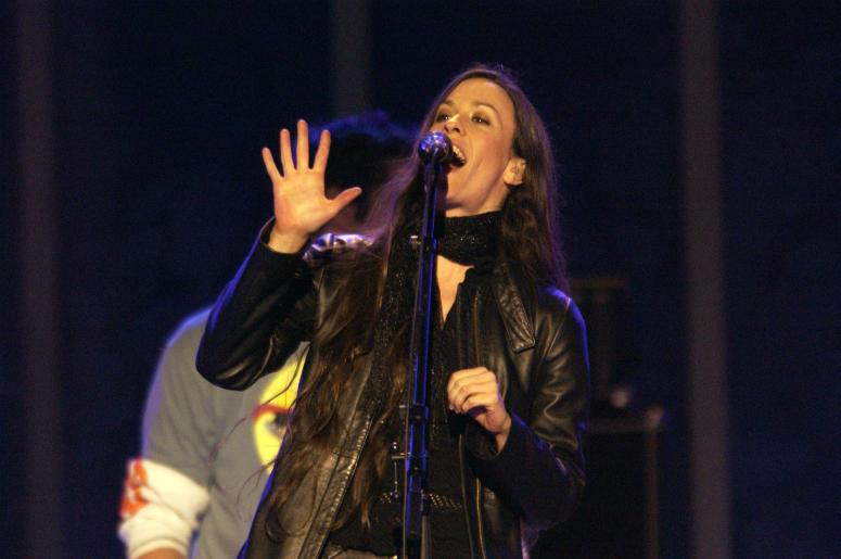 Alanis Morissette performs after the Medals Ceremony during the 2002 Salt Lake Winter Olympics Alanis Morissette performs after the Medals Ceremony during the 2002 Salt Lake Winter Olympics