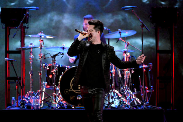 Brendon Urie of Panic! at the Disco performs onstage Brendon Urie of Panic! at the Disco performs onstage