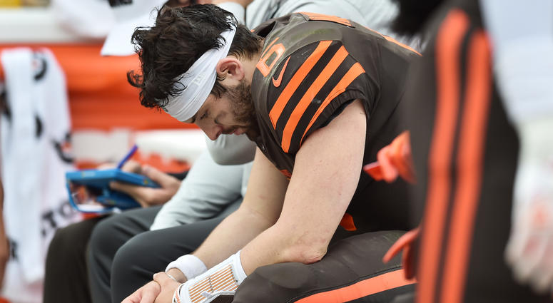 Cleveland Browns quarterback Baker Mayfield (6) bows his head on the bench during the first half against the Tennessee Titans at FirstEnergy Stadium Cleveland Browns quarterback Baker Mayfield (6) bows his head on the bench during the first half against the Tennessee Titans at FirstEnergy Stadium