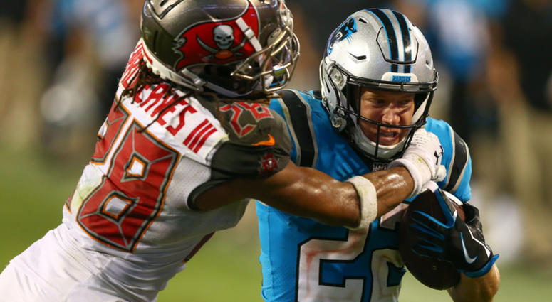 Carolina Panthers running back Christian McCaffrey (22) is shoved out of bounds by Tampa Bay Buccaneers cornerback Vernon III Hargreaves (28) during the fourth quarter at Bank of America Stadium Carolina Panthers running back Christian McCaffrey (22) is shoved out of bounds by Tampa Bay Buccaneers cornerback Vernon III Hargreaves (28) during the fourth quarter at Bank of America Stadium