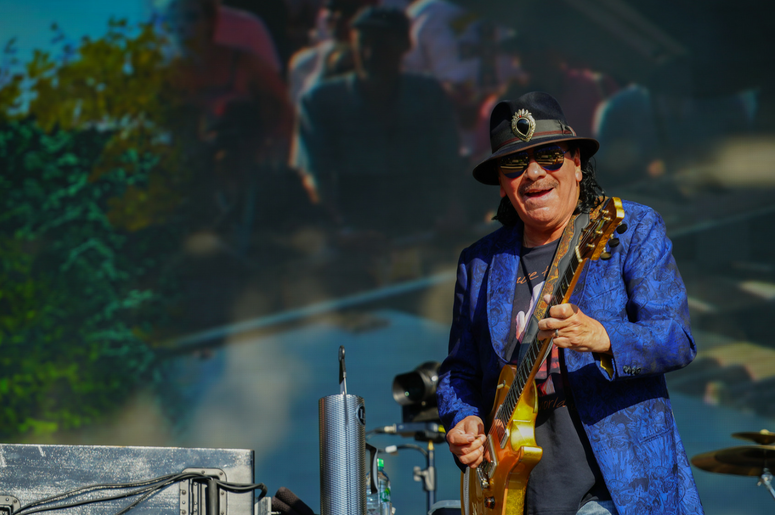 Carlos Santana of Santana performing live on the Great Oak stage Carlos Santana of Santana performing live on the Great Oak stage