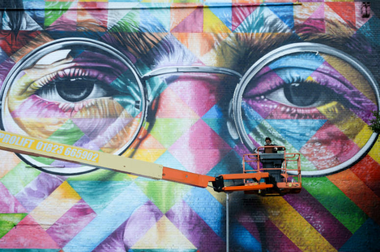 John Lennon mural in Bristol 1/1/2018 - Review of the Year 2017: July: A graffiti artist works on a huge mural of John Lennon as he takes part in Upfest, a street art and graffiti festival in Bristol.