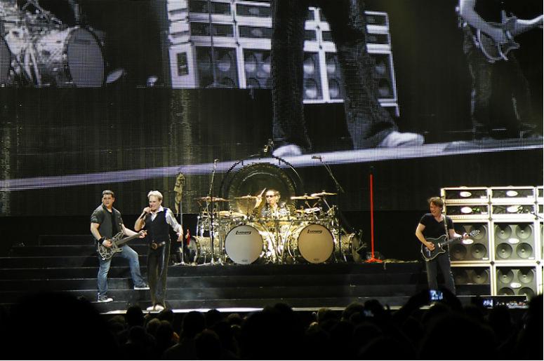 Van Halen in concert at the Amway center in Orlando Florida; with original singer David Lee Roth. The group is on their 2012 North America Tour Van Halen in concert at the Amway center in Orlando Florida; with original singer David Lee Roth. The group is on their 2012 North America Tour