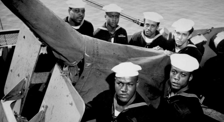 1. A gun crew of six Negroes who were given the Navy Cross for standing by their gun when their ship was damaged by enemy attack in the Philippine area