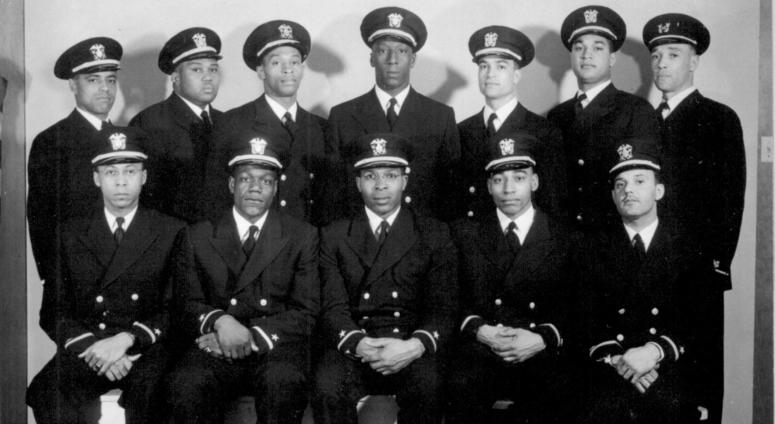 Group of recently appointed Negro officers Ensigns George Clinton Cooper, Graham Edward Martin, Jesse Walter Arbor, John Walter Reagan, Reginald Ernest Goodwin. Back row, left to right, Ensigns Phillip George Barnes, Samuel Edward Barnes, Dalton Louis Baugh, James Edward Hare, Frank Ellis Sublett,