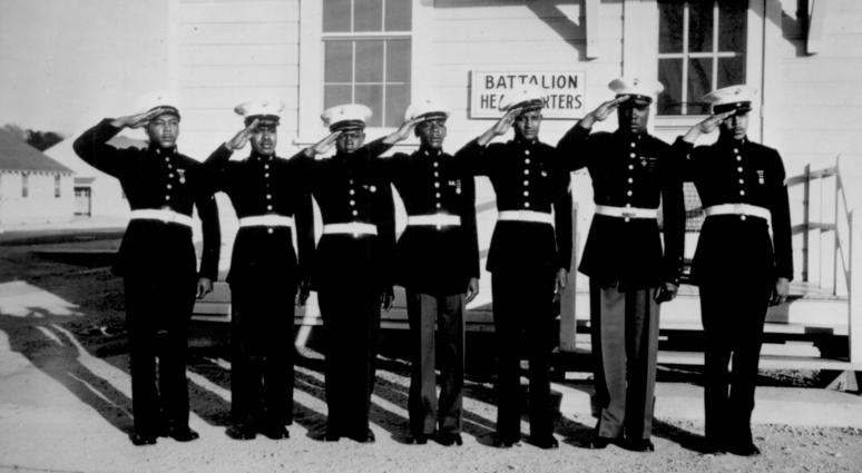 Photo shows a group of the Negro volunteers in their dress uniforms. Although a dress uniform is not a part of the regular equipment, most of the Negro Marines spend $54 out of their pay for what is generally considered the snappiest uniform in the armed services