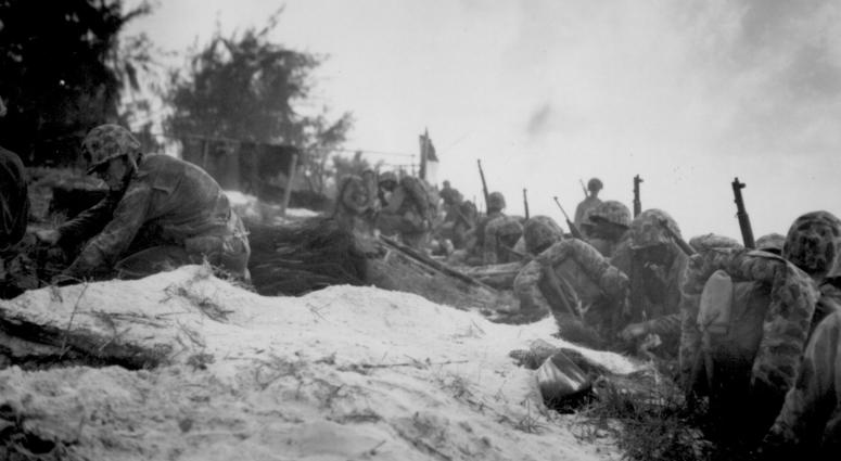 June 1944 Negro assault troops await orders D-day to attack enemy shortly after they had come ashore at Saipan in the Marianas