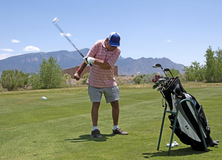 U.S. Army Veteran Joe Martinek uses an adaptive swing at the Twin Warriors Golf Club, Bernalillo, New Mexico, while participating in the New Mexico VA Health Care System’s adaptive sports program U.S. Army Veteran Joe Martinek uses an adaptive swing at the Twin Warriors Golf Club, Bernalillo, New Mexico, while participating in the New Mexico VA Health Care System’s adaptive sports program