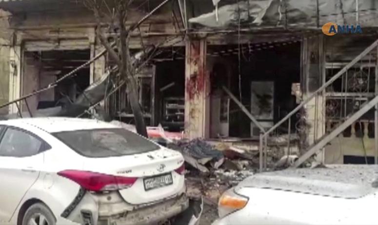 A damaged restaurant where an explosion occurred, in Manbij, Syria, Wednesday, Jan. 16, 2019.