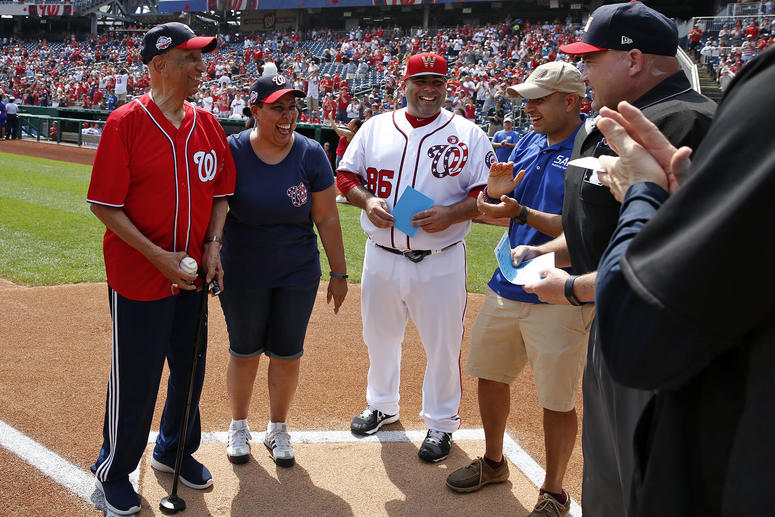 World War II veteran Ellsworth Hutchinson, Jr. delivers game ball World War II veteran Ellsworth Hutchinson, Jr. delivers game ball