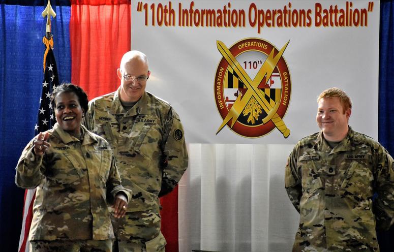 U.S. Army Sgt. 1st Class Quintin C. Steele, intelligence specialist, stands with Sgt. Maj. Perlisa D. Wilson, senior enlisted leader, and Lt. Col. Stephen P. Gerber, a senior intelligence officer, during a promotion ceremony at the 110th Information Opera MarylandArmyNationalGuardAllFemale