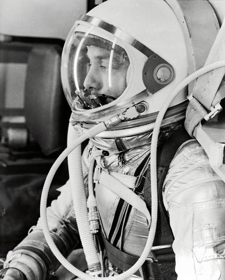 Astronaut Alan B. Shepard Jr., in his silver pressure suit with the helmet visor closed, prepares for his Mercury Redstone 3 launch on May 5, 1961.