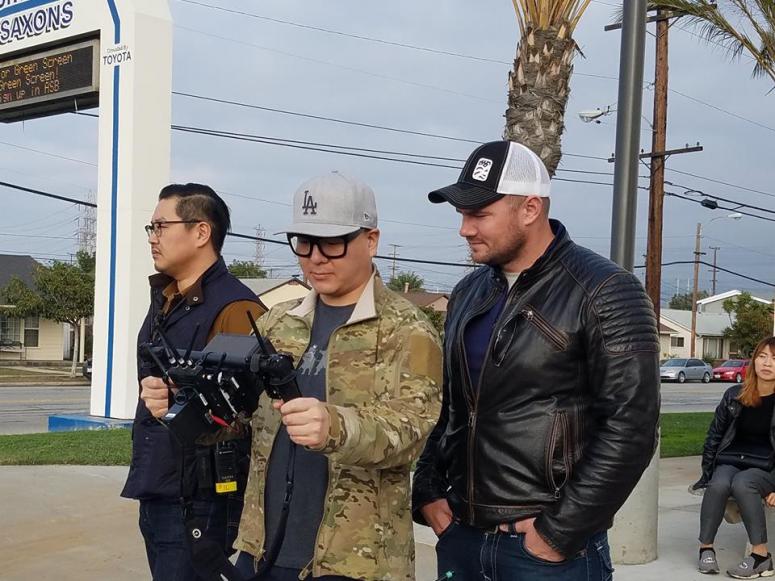 Grunt Style Founder & CEO Dan Alarik (right) looks on during the production of the company's first national TV commercial which began airing in 2017.