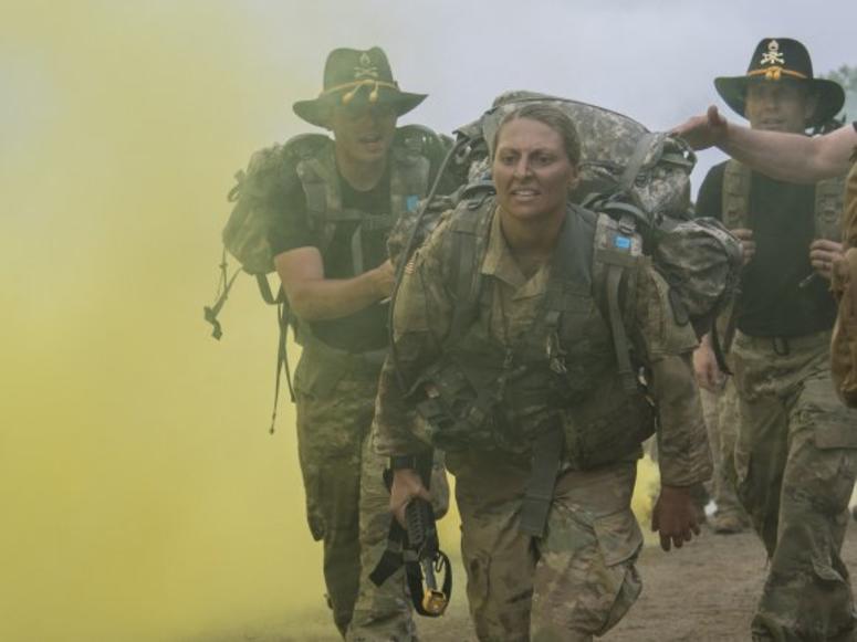 Sgt. Danielle Martin approaches the finish of a ruck march during the 1-134th Cavalry Squadron's spur ride during annual training in the Republic of Korea. Sgt. Danielle Martin approaches the finish of a ruck march during the 1-134th Cavalry Squadron's spur ride during annual training in the Republic of Korea