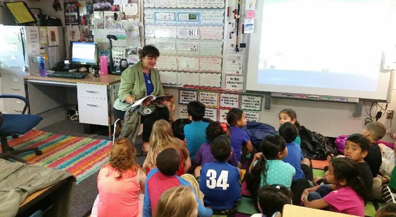 Graciela reads during classroom visit Graciela reads during classroom visit