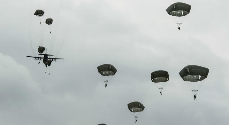International Patatroopers participating in the D-Day Commemoration Airborne Operation fall into Iron Mike Drop Zone outside of Saint-Mere-Eglise, France. Over 1,000 U.S. paratroopers participate in largest airborne operation since WWII to commemorate 75th anniversary of D-Day.