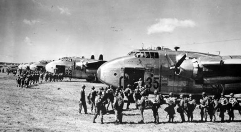 Paratroopers of the 82nd Airborne Division climb into their Fairchild Flying Boxcar (Fairchild C-82) during maneuvers at Fort Bragg, North Carolina.