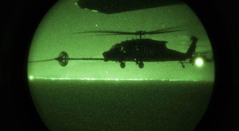 A U.S. Army MH-60 Black Hawk with the 160th Special Operations Aviation Regiment (SOAR) conducts night air-to-air refueling with Marine Aerial Refueler Transport Squadron (VMGR) 152 during unit-level training called El Centro Horizon at Naval Air Facility
