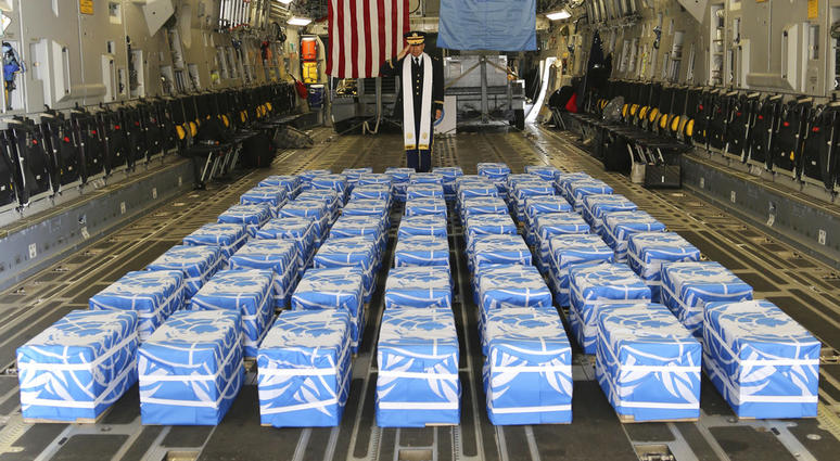 United Nations Command Chaplain U.S. Army Col. Sam Lee performs a blessing of sacrifice and remembrance on the 55 cases of remains believed to be U.S. servicemen killed during the Korean War and returned by North Korea at Osan Air Base in Pyeongtaek, Sout
