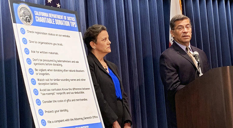 California Attorney General Xavier Becerra, right, and senior Assistant Attorney Genera Tania Ibanez announce a lawsuit the state has filed alleging misdeeds by Move America Forward California Attorney General Xavier Becerra, right, and senior Assistant Attorney Genera Tania Ibanez announce a lawsuit the state has filed alleging misdeeds by Move America Forward