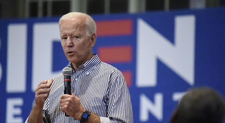 Former Vice President Joe Biden speaks, Wednesday, Aug. 28, 2019, at a town hall for his Democratic presidential campaign in Spartanburg, S.C. Biden defends faulty telling of military heroism story