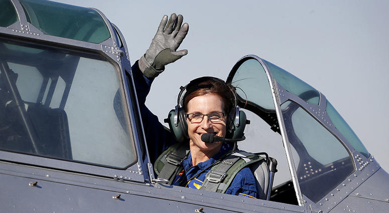 FILE - In this Jan. 12, 2018, file photo, Rep. Martha McSally, R-Ariz., leaves in a T-6 World War II airplane after speaking at a rally in Phoenix. Women with military experience _ many of them combat veterans _ are among the record number of female candi