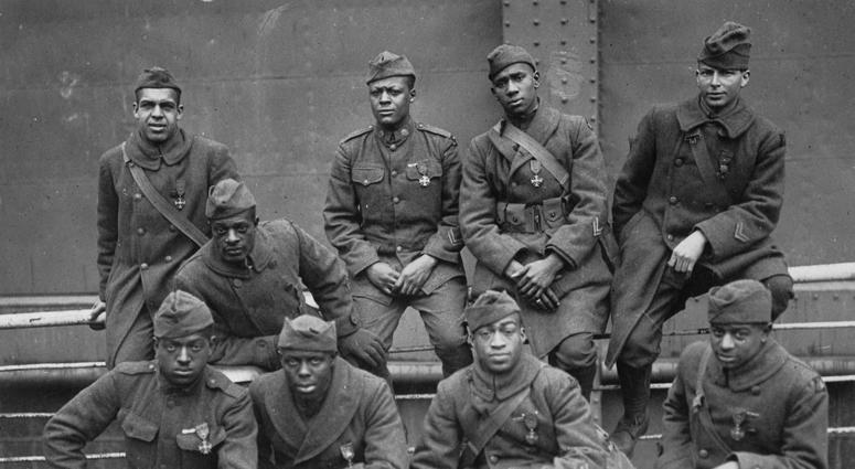 "Some of the colored men of the 369th (15th N.Y.) who won the Croix de Guerre for gallantry in action." Left to right. Front row: Pvt. Ed Williams, Herbert Taylor, Pvt. Leon Fraitor, Pvt. Ralph Hawkins. Back Row: Sgt. H. D. Prinas, Sgt. Dan Strorms, Pvt. ARC Identifier:26431282