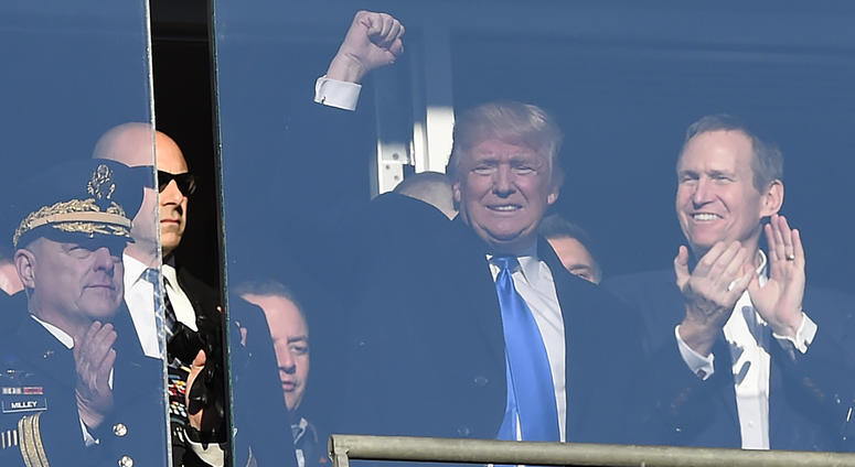 United States of America president elect Donald Trump waves to the crowd from a suit during the first quarter of the 117 annual Army Navy game at M&T Bank Stadium.