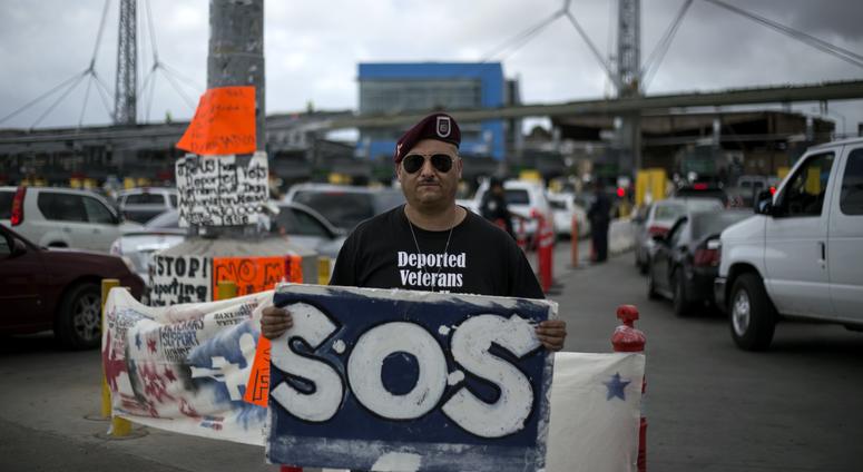 The deported veteran Hector Barajas Varela, 36 years old, takes part during a demonstration at the San Ysidro Gate, in Tijuana, northwest Mexico, on March 27, 2014.