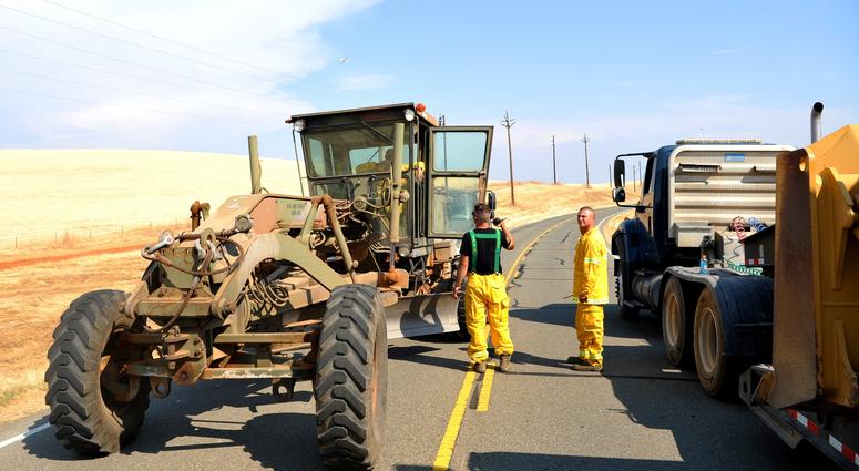 Firefighters from the 9th Civil Engineer Squadron respond to a fire Aug. 20, 2017, at Beale Air Force Base, California. The fire burned approximately 900 acres of land both on and off base. Beale firefighters worked with various fire departments including