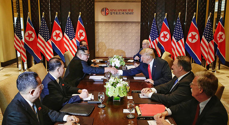 Top leader of the Democratic People's Republic of Korea (DPRK) Kim Jong Un (3rd L) holds talks with U.S. President Donald Trump (3rd R) in Singapore, on June 12, 2018.