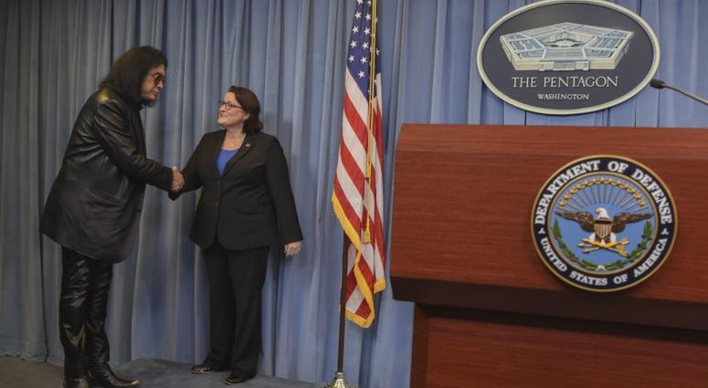 Acting Principal Deputy Assistant to the Secretary of Defense for Public Affairs Kimberley Joiner introduces Gene Simmons of KISS to a meet-and-greet with service members and civilians, at the Pentagon, Washington, D.C., May 16, 2019. GeneSimmonsPentagon9