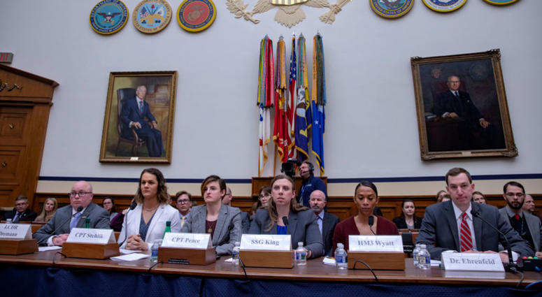 WASHINGTON, DC - FEBRUARY 27: Navy Lt. Commander Blake Dremann, Army Capt. Alivia Stehlik, Army Capt. Jennifer Peace, Army Staff Sgt. Patricia King, Navy Petty Officer 3rd Class Akira Wyatt, and Dr. Jesse M. Ehrenfeld, chair-elect of the American Medical House Armed Services Committee Holds Hearing On Transgender Troops In The Military