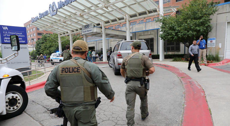 Police officers enter Jesse Brown VA Medical Center after reports of possible shots fired inside the hospital on Monday, Aug. 12, 2019 in Chicago. Police officers enter Jesse Brown VA Medical Center after reports of possible shots fired inside the hospital on Monday, Aug. 12, 2019 in Chicago.