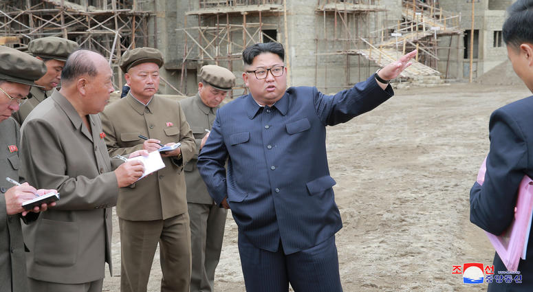 hoto provided by Korean Central News Agency (KCNA) on July 10, 2018 shows Kim Jong Un (C), top leader of the Democratic People's Republic of Korea (DPRK).