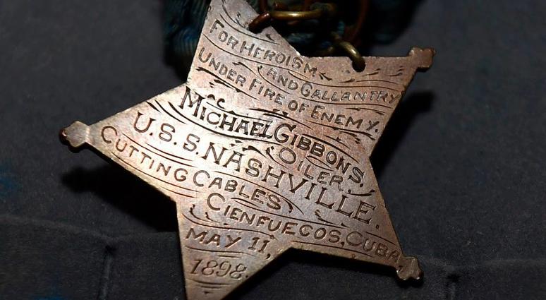 Medal of Honor presented to Irish-American sailor Michael Gibbons for his actions off Cuba during the Spanish-American War.