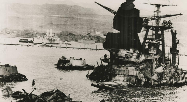 Original caption on front reads: "USS Arizona (BB39) - View from ahead looking aft, 10, Dec. 1941". Original caption on back reads: "Damages to the ships of Pearl Harbor, Hawaii, after the surprise Japanese attack on 7 Dec. 1941". Archivist note: conflic