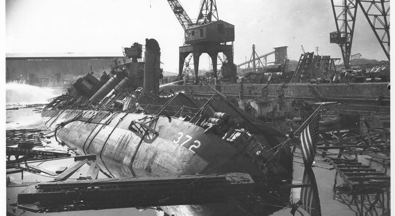 (Photo courtesy of National Archives) Damaged ships after the Japanese attack on Pearl Harbor, Dec. 7 1941. The USS Cassin (DD372) and the USS Downes (DD375) in Drydock No. 1.